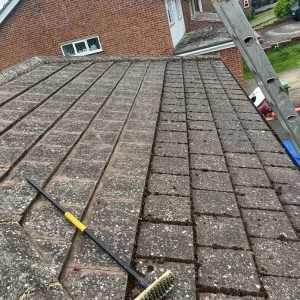 A roof in Kent before having its moss removed professionally by our team